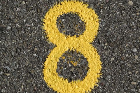 Number eight painted in the pavement