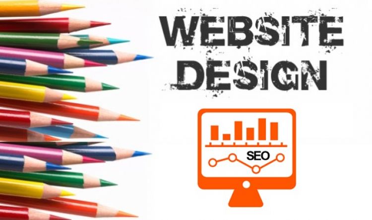 Website Design with pencils near monitor