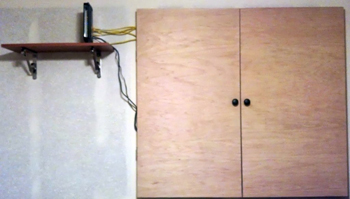My new wireless router shelf and closed panel