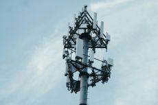 Closeup of the top of a 5G tower.